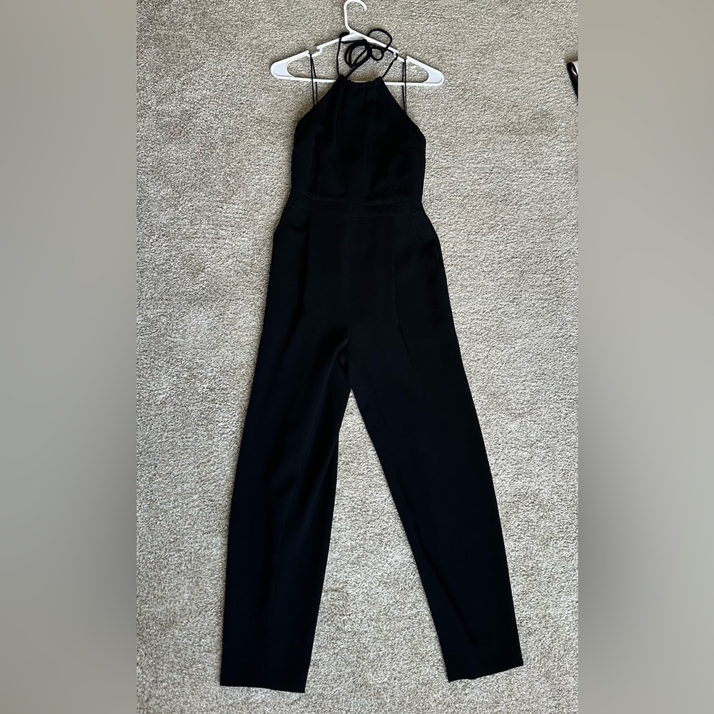 Women’s black backless halter paint suit